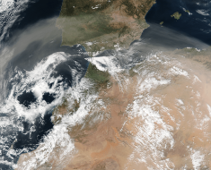 Using Machine Learning to Reconstruct Cloud-Obscured Dust Plumes